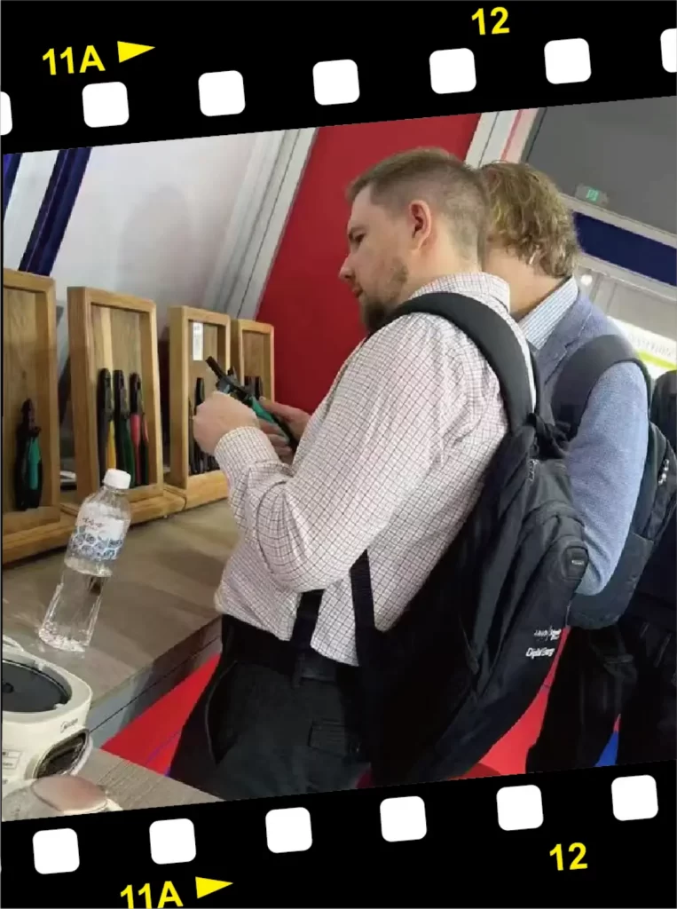 two customers checking the BEYOND pliers at hand tools fairs
