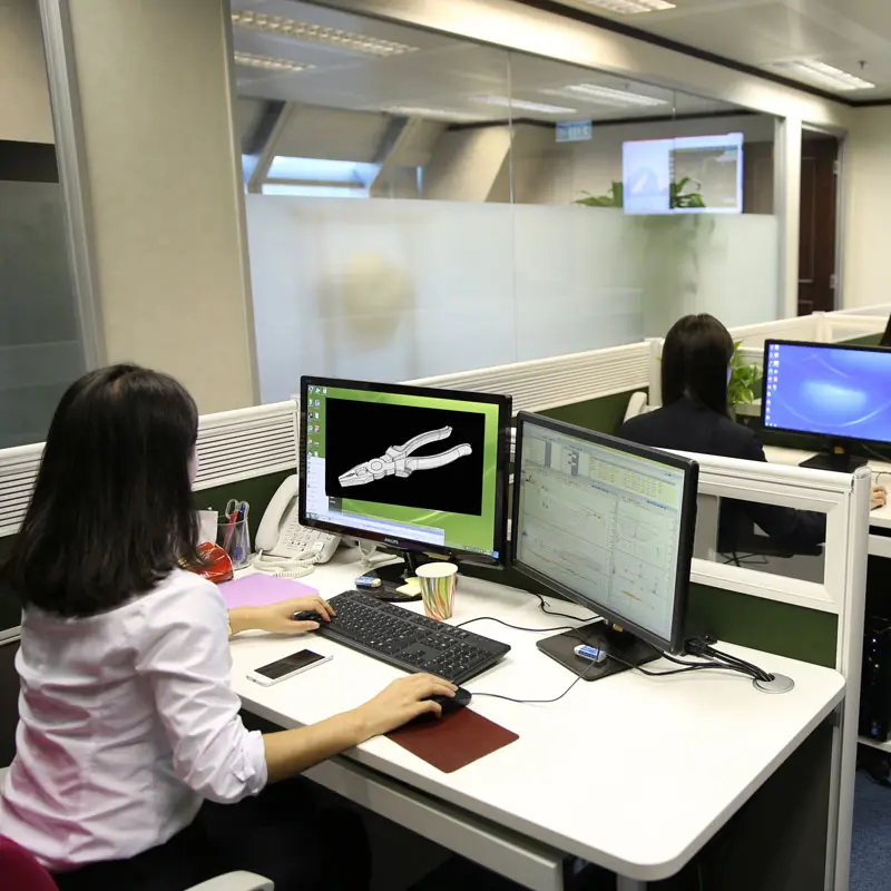 high leverage plier designers working in the office