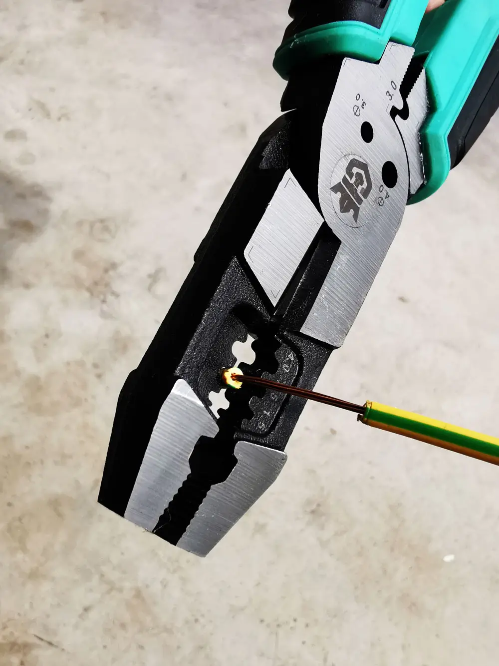 Multi-tool plier stripping wire insulation. 30% effort saving, precise gauge stripping, OEM custom.